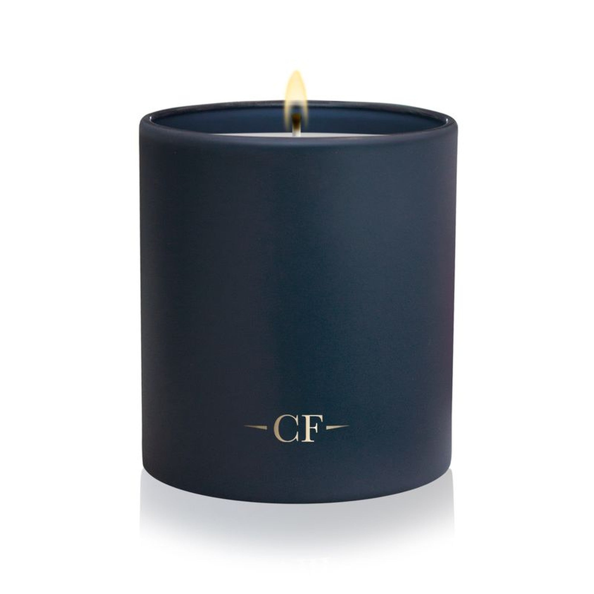 Charles Farris Winter Embers single wick scented candle, lit, in smoked oak, pine and patchouli