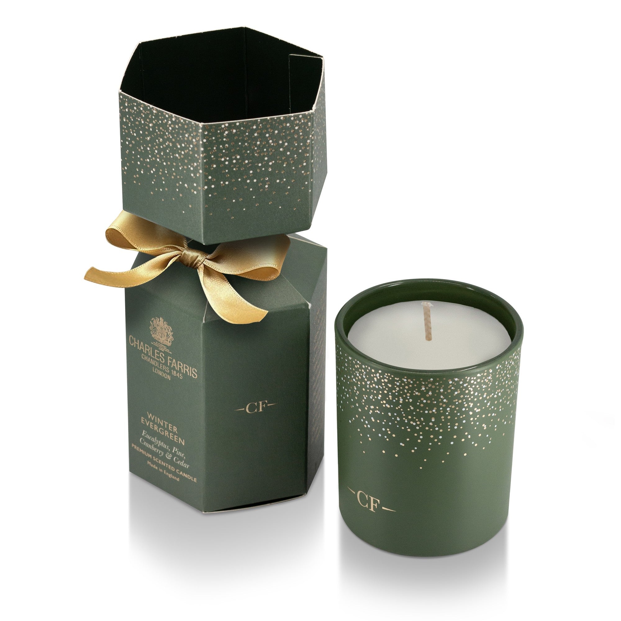 Charles Farris Winter Evergreen Christmas cracker candle, side view, in eucalyptus, pine, cranberry and cedar