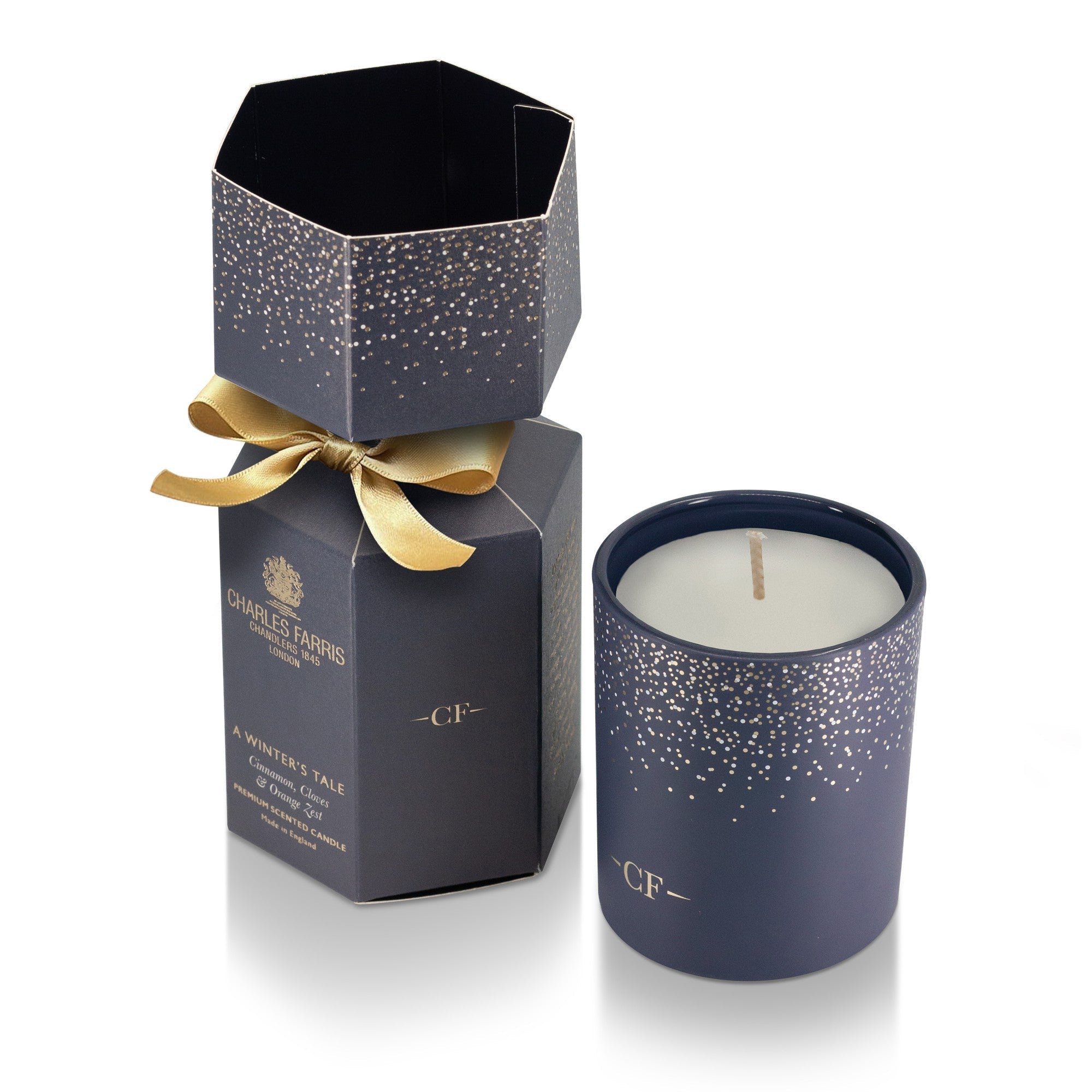 Charles Farris A Winter's Tale Christmas cracker candle, side view, in orange zest, cinnamon and clove
