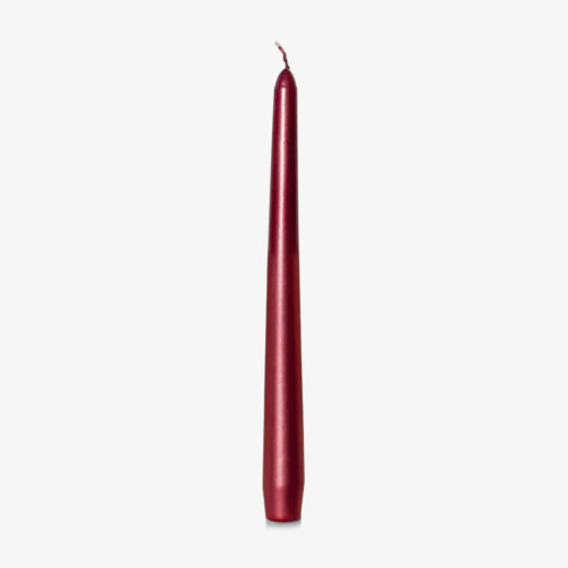 red coloured tapered candle