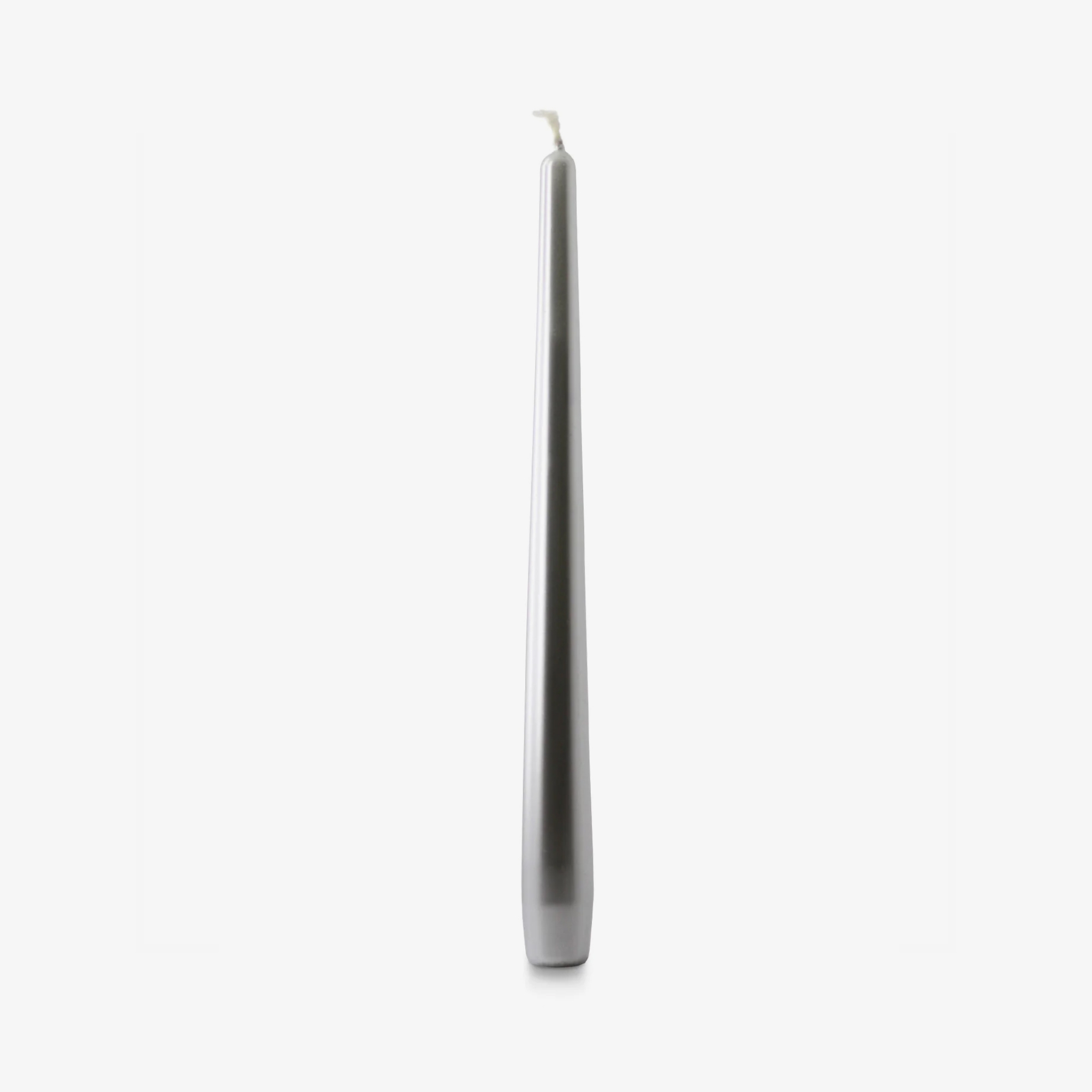 silver coloured tapered candle