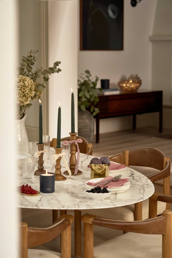 Green Dining Candles on a breakfast table