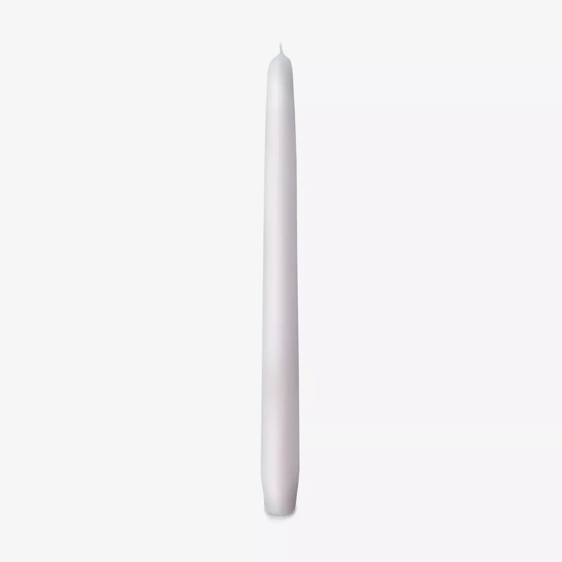 white coloured tapered candle